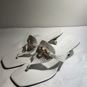 Gently used white leather sandals are the Tory Burch Jessa Low kitten heel sz 9M